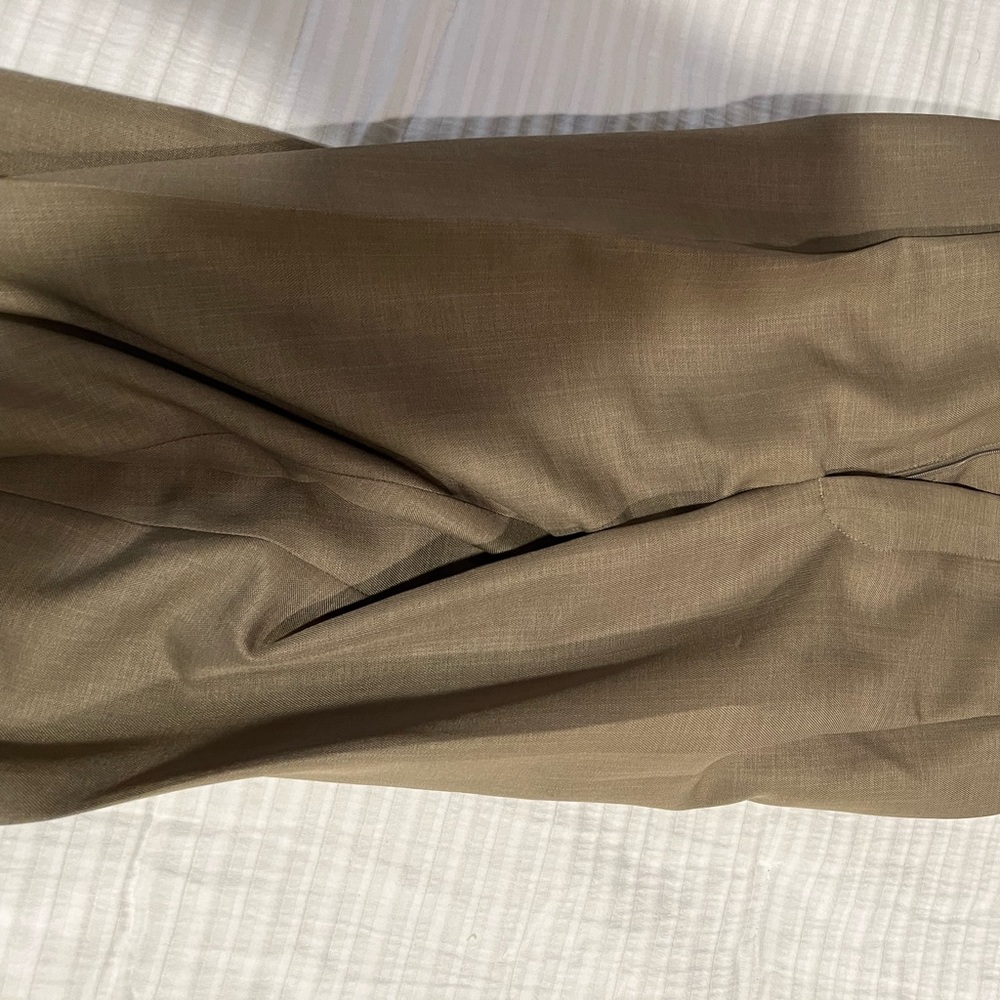 Very lightly worn. Like new. Size 36/34. The cloth has the look of linen/wool.